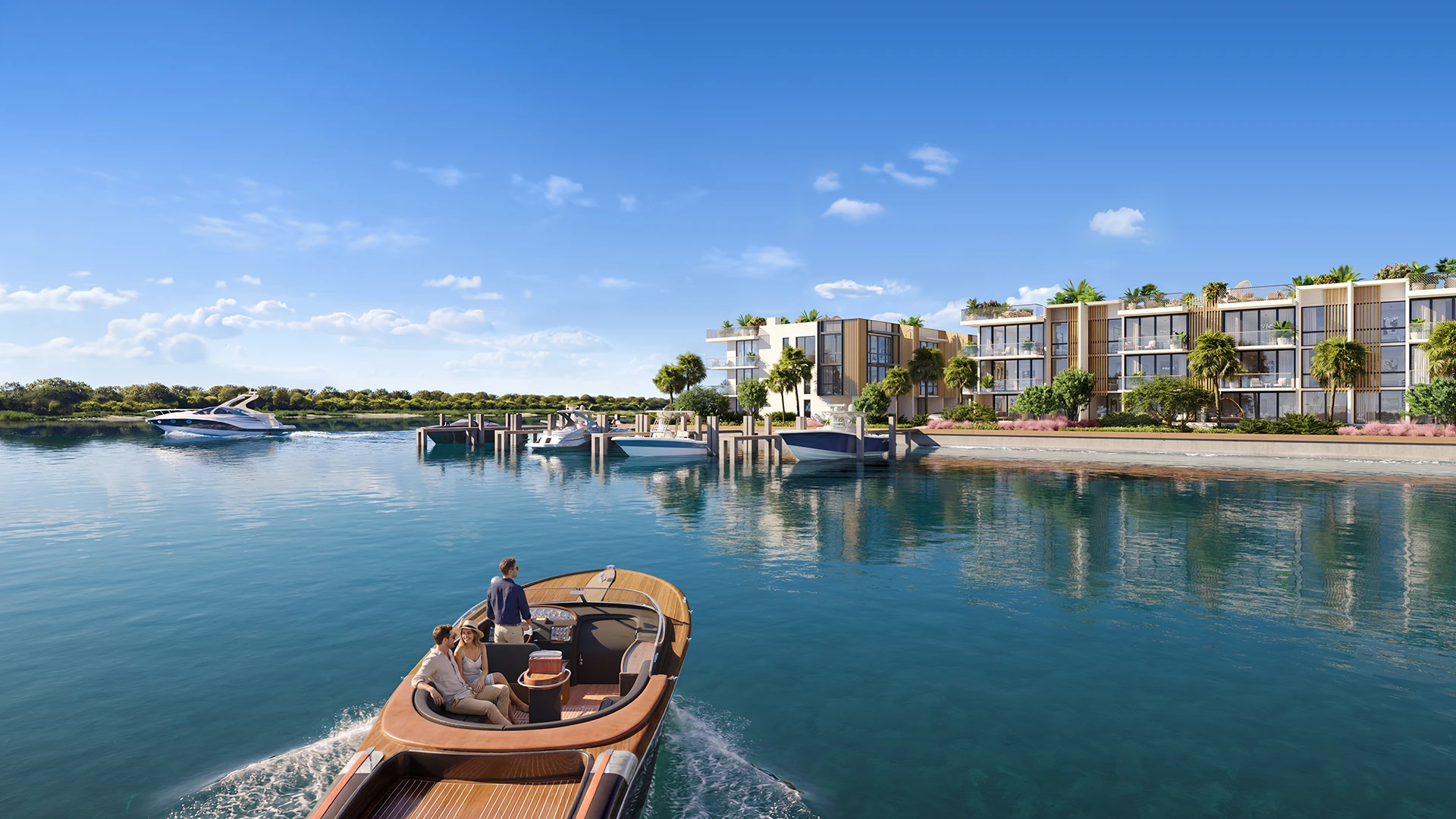 Luxury waterfront residences beside a marina with boats and a wooden motorboat on calm blue water.