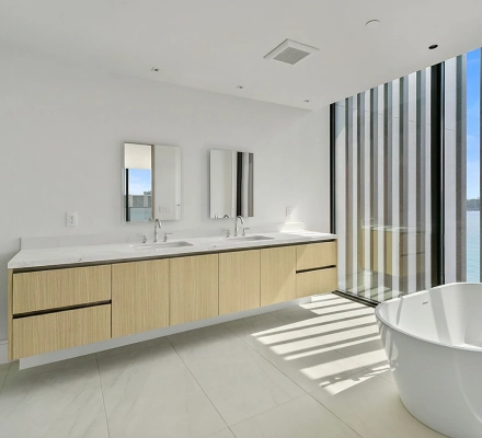 Bathroom with freestanding tub and vertical window fins